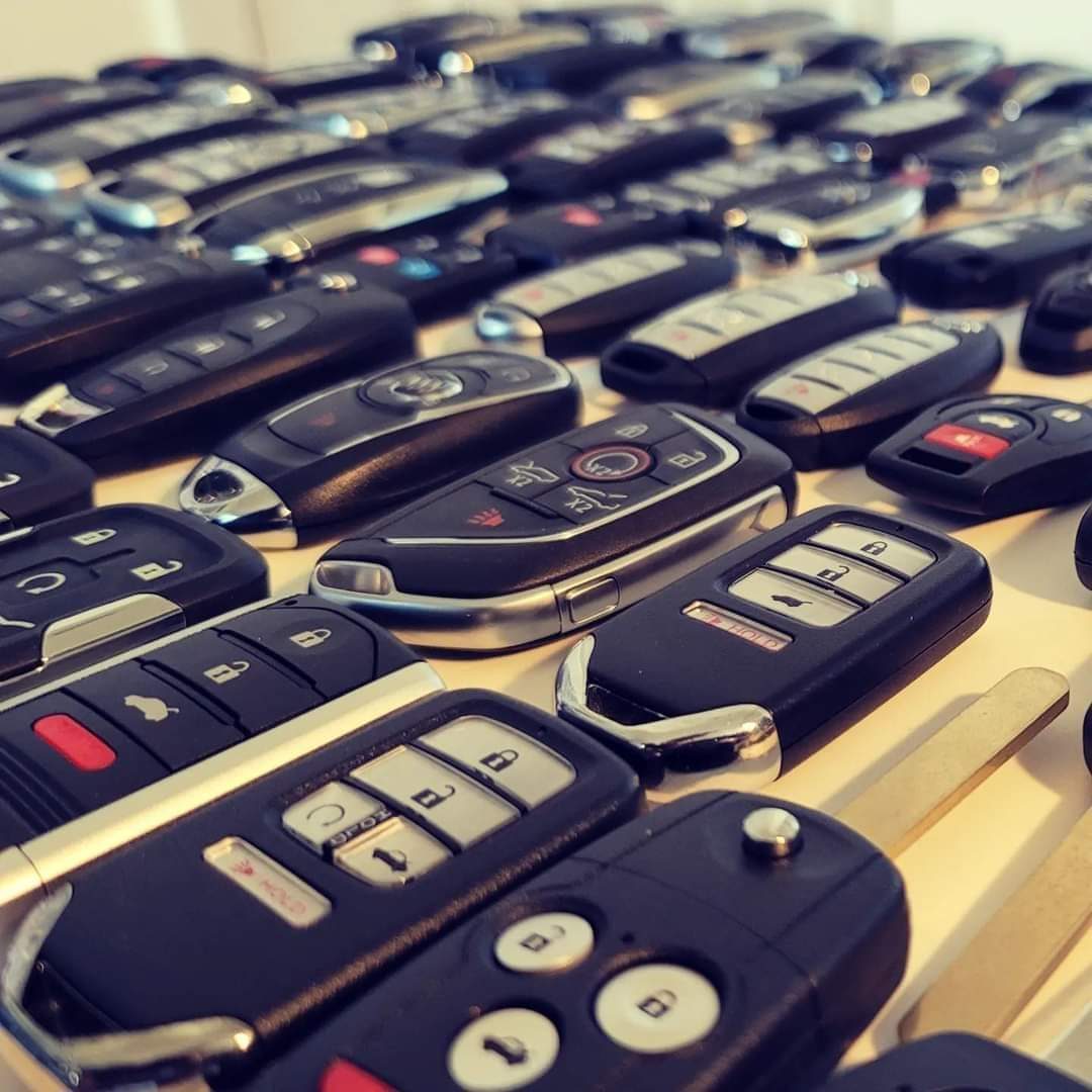 Rows of automotive key fobs and blanks cut by Poplockin Mobile Locksmith