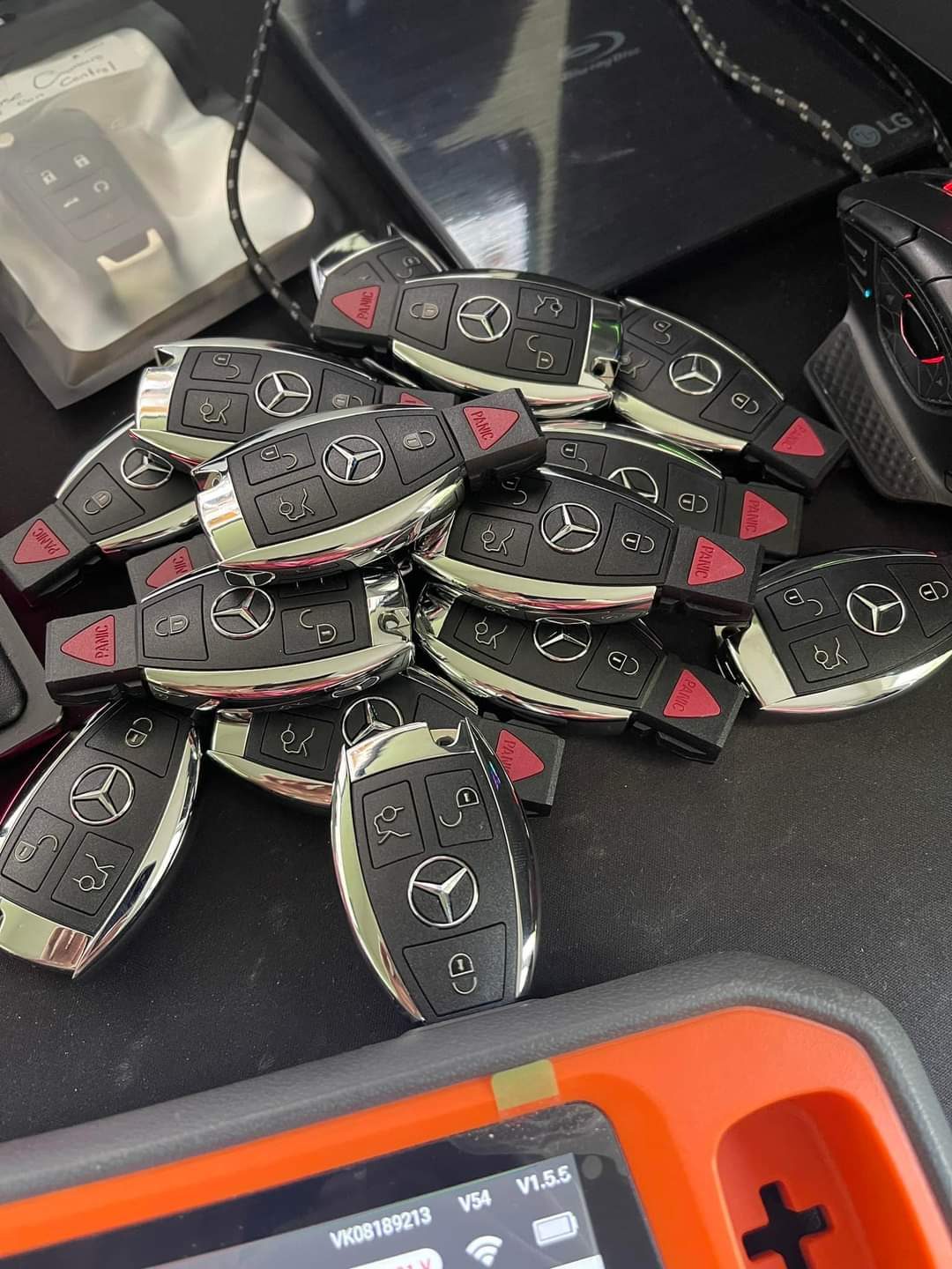 Mercedes-Benz and foreign smart key fobs paired via OBD-II programming hardware